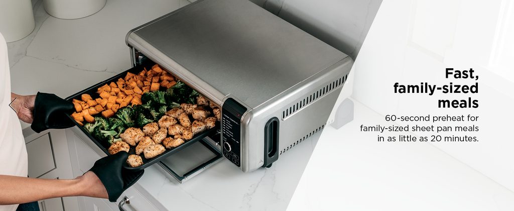 Ninja SP101 Digital Air Fry Countertop Oven in stainless steel on kitchen counter