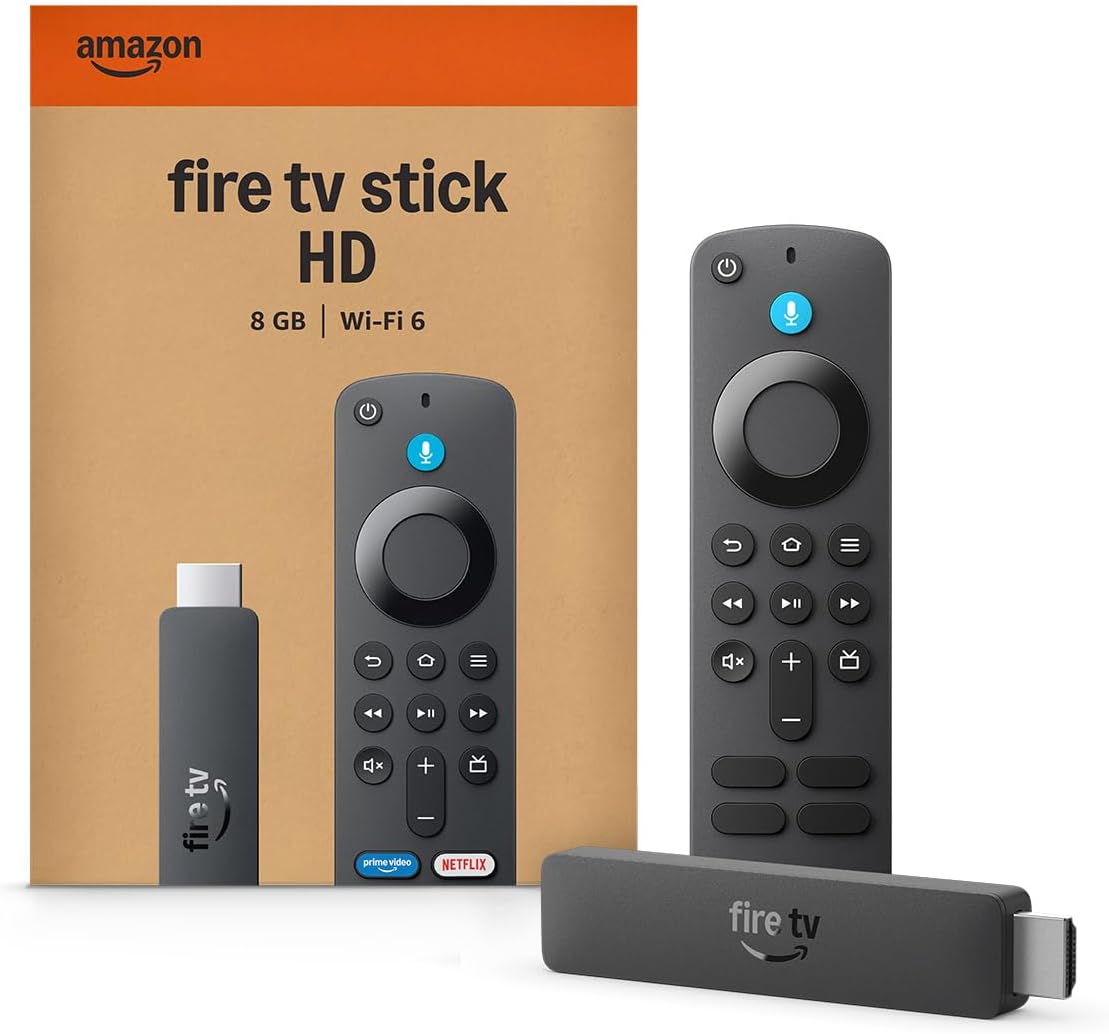 Amazon Fire TV Stick HD newest model streaming device plugged into a modern flat-screen TV showing the new 2026 Fire TV interface with streaming apps and live TV channels. Alexa Voice Remote on a coffee table. Clean entertainment center setup with no visible wall adapter thanks to Direct Power USB-C connection. Ultra-portable 1.2 ounce device. Now 60% off at $15.99 on Amazon.